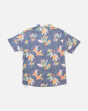 Short-sleeve shirt with colorful floral pattern on a white background