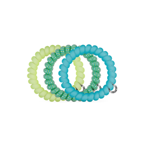 Set of three turquoise and green beaded bracelets on a white background