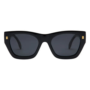 Black cat-eye sunglasses with dark gray lenses and small gold square accents on the temples, shown against a plain white background.