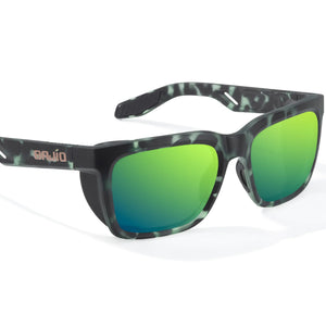 Sunglasses with green lenses and camouflage frame on a white background