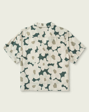 Floral patterned shirt on a plain background