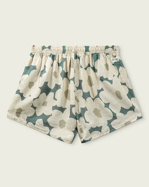 Floral patterned shorts on a light gray background