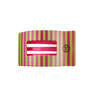 Striped hair clip with a pink and white stripe on a white background