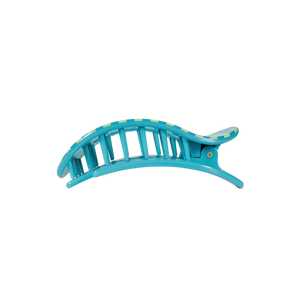Blue hair clip on a white background